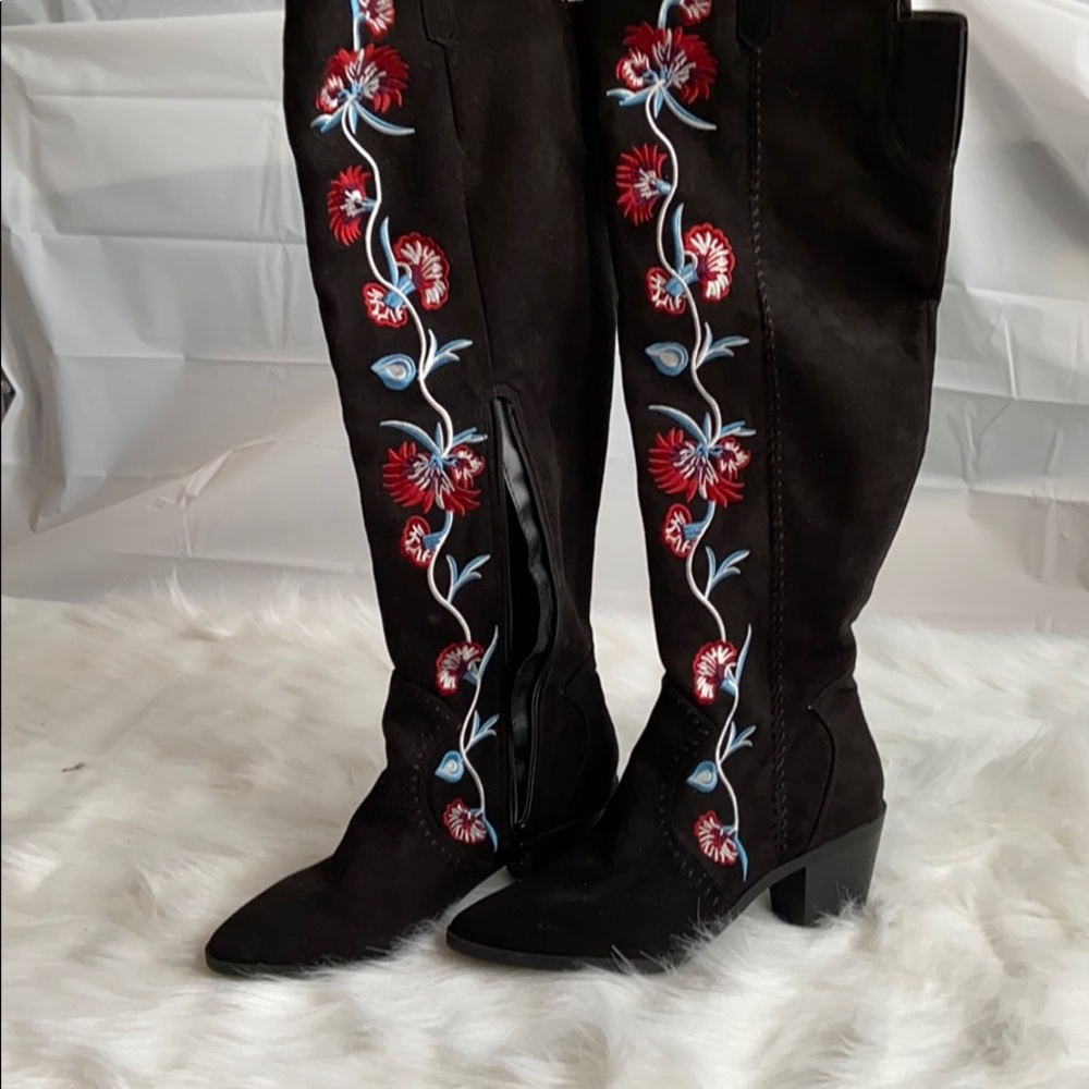 Carols over the knee boots.